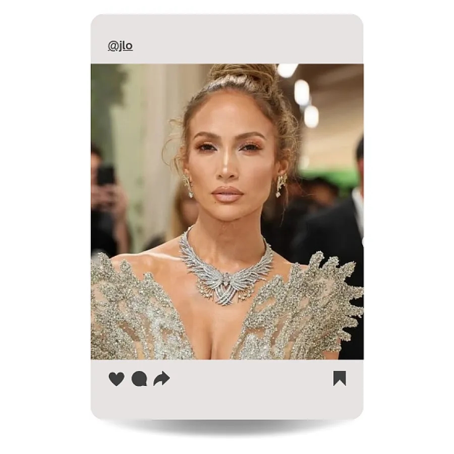 Jennifer Lopez with a messy bun and glowy make-up look at the Met Gala 2024